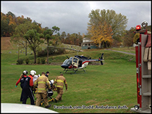 Responders transferring a patient to a air ambulance.